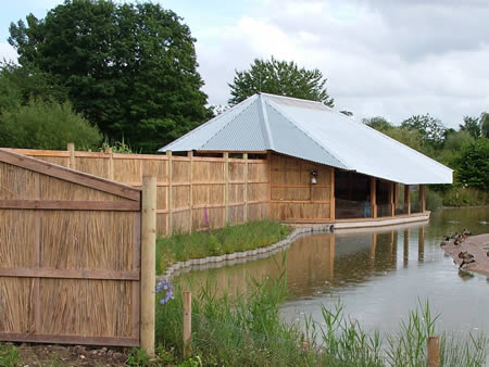 Timber Bird Hide with reed fencing